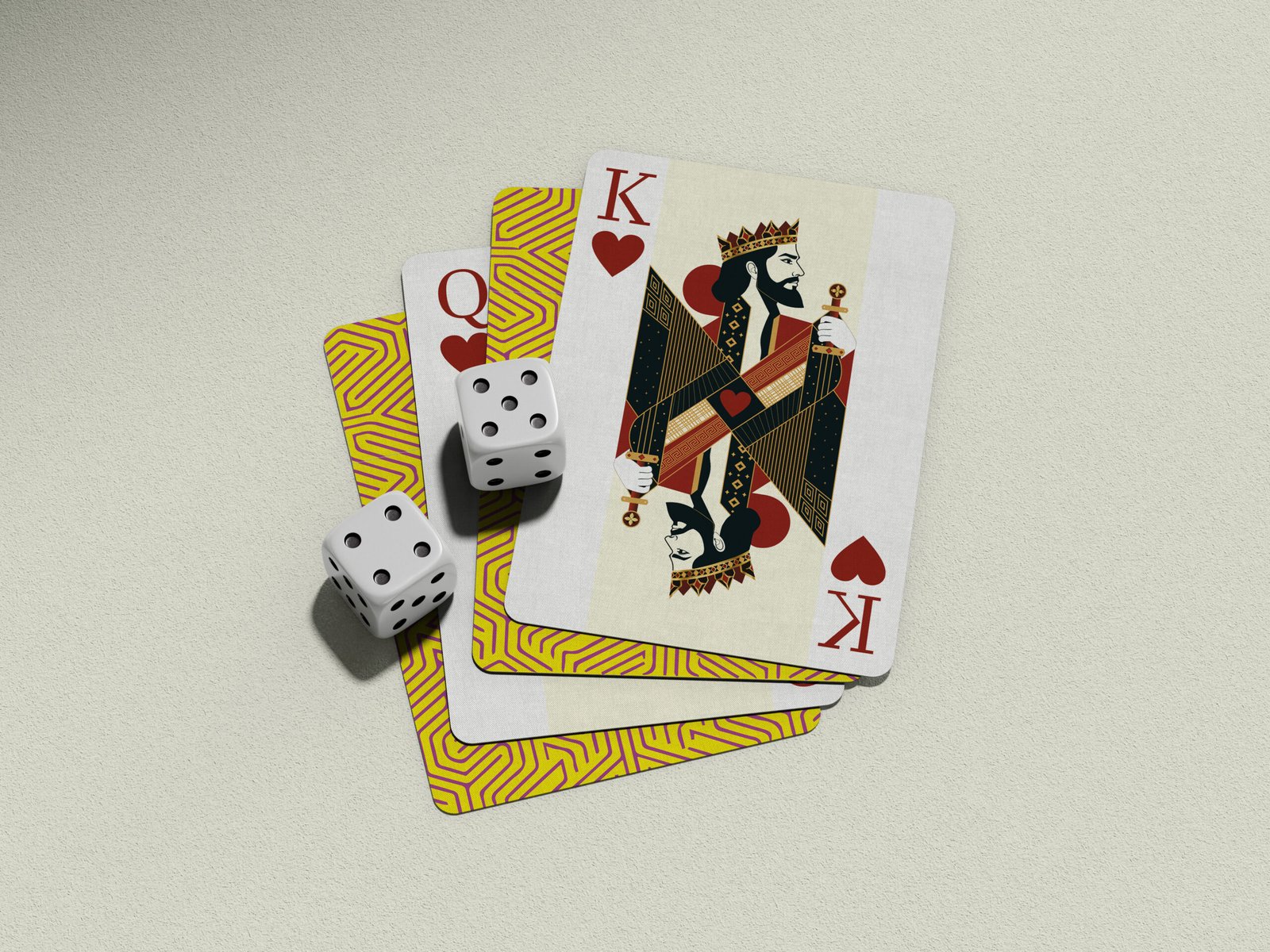 King, queen, and jack of hearts with dice